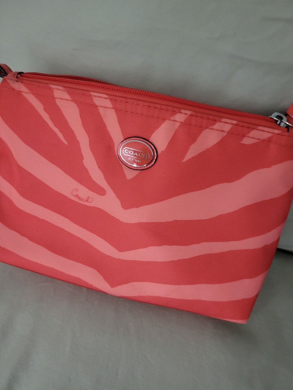 Coach Coral and Light Coral Zebra-Stripe Cosmetic Bag
